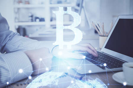 Blockchain theme hud with man working on computer on background. Concept of crypto chain. Double...