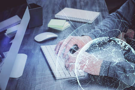 Media network theme hologram with man working on computer on background. Concept of internet...