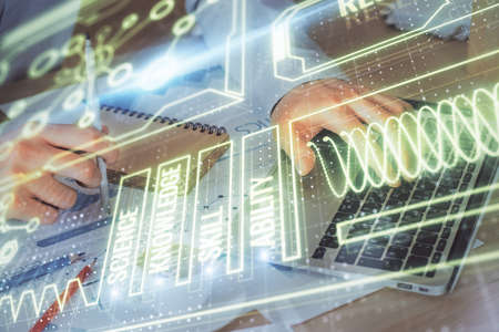 Science hologram with man working on computer on background. Concept of study. Double exposure.