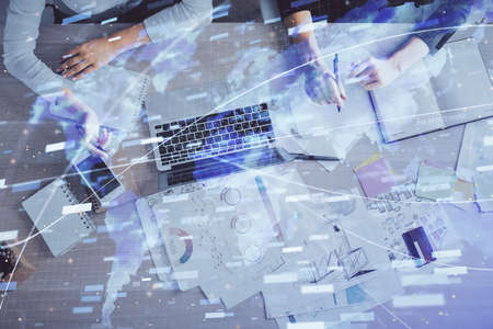 Double exposure of woman hands working on computer and data theme hologram drawing. Top View....