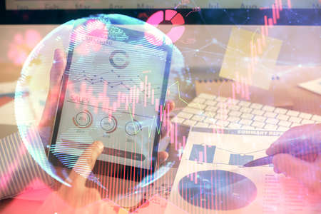 Double exposure of man's hands holding and using a phone and international business theme drawing.