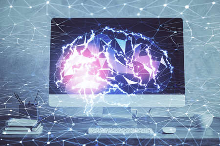 Multi exposure of work table with computer and brain hologram. Brainstorm concept.の写真素材