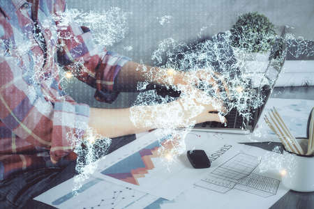 Media network theme hologram with man working on computer on background. Concept of internet communication. Double exposure.の写真素材