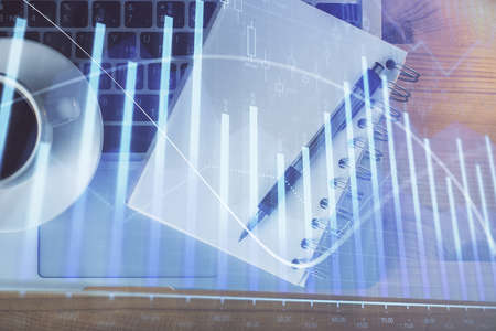 Multi exposure of forex chart drawing and work table top veiw. Concept of financial analysis.