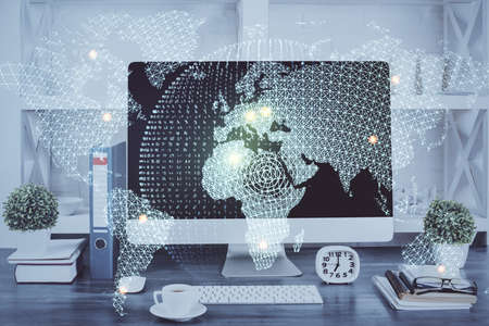 Double exposure of business theme icons and work space with computer background. Concept of success.の写真素材