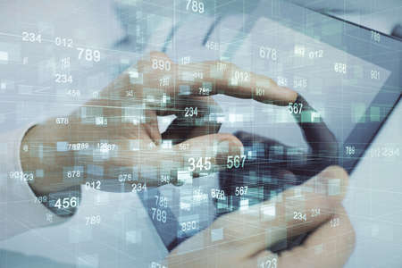 Multi exposure of man's hand holding and using a digital device and data theme drawing. Innovation...