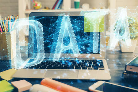 Double exposure of desktop with personal computer on background and tech theme drawing. Concept of data analysis.の写真素材