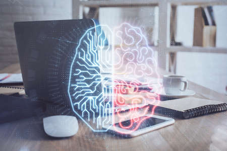 Double exposure of work table with computer and brain sketch hologram. Brainstorming concept.の写真素材