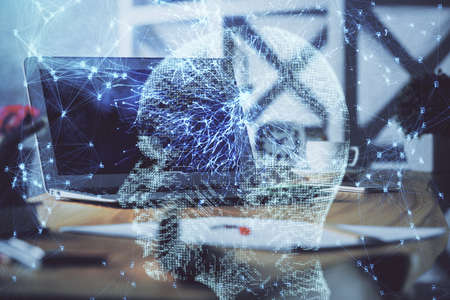 Double exposure of work table with computer and brain sketch hologram. Brainstorming concept.の写真素材