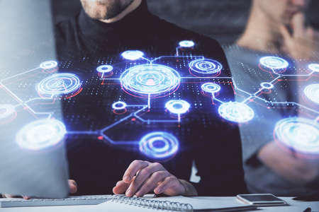 Media network theme hologram with man working on computer on background. Concept of internet...