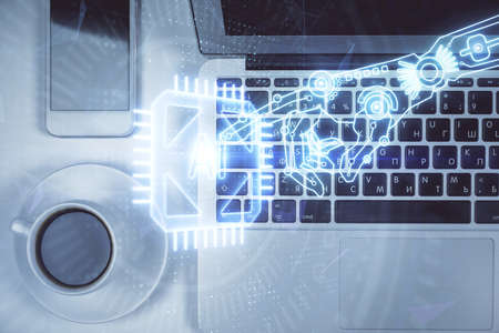 Multi exposure of data theme drawing hologram over topview work desk background with computer....