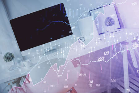 Double exposure of financial graph drawing and office interior background. Concept of stock market.