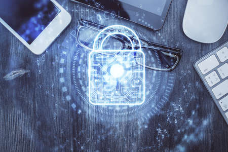 Double exposure of lock drawing over desktop. Top view. Security concept.の写真素材