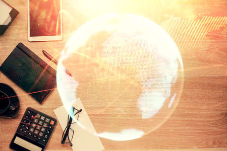 Multi exposure of business theme drawing and work table top veiw. Concept of international finance.