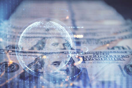 Double exposure of world map drawing over us dollars bill background. International concept.の写真素材