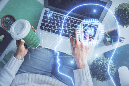 Double exposure of woman working on computer andhuman brain hologram drawing. Top View. Ai concept.