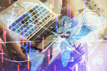 Multi exposure of woman hands typing on computer and business theme hologram drawing. Success...
