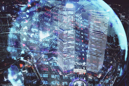Double exposure of business theme hologram drawing and city veiw background. Concept of success.の写真素材