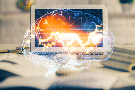 Double exposure of work space with computer and human brain drawing hologram. Brainstorm concept.