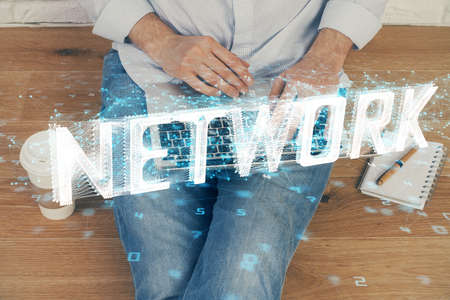 Multi exposure of data internet theme hologram with man working on computer on background. Concept...
