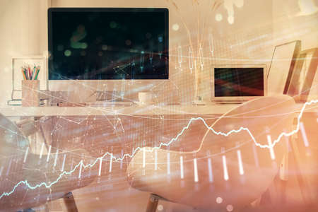 Double exposure of stock market graph drawing and office interior background. Concept of financial analysis.の写真素材