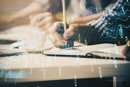 Multi exposure of two men planing investment with stock market forex chart background. Concept of...