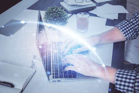 Social network theme hologram with businessman working on computer on background. Multi exposure.の写真素材
