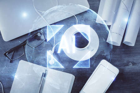 Multi exposure of data drawing hologram over topview of study desk background with computer. Concept of technology.の写真素材