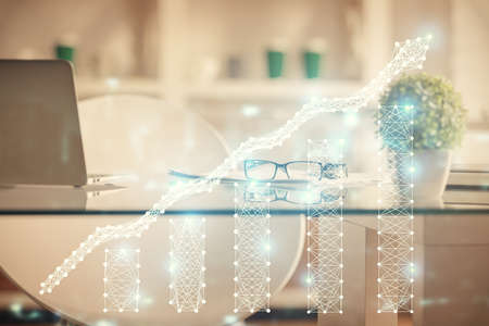 Double exposure of financial graph drawing and office interior background. Concept of stock market.の写真素材