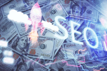 Double exposure of seo drawing over us dollars bill background. Concept of search optimization.の写真素材