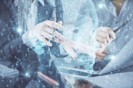 Double exposure of man and woman working together and brain drawing hologram. Intellectual...