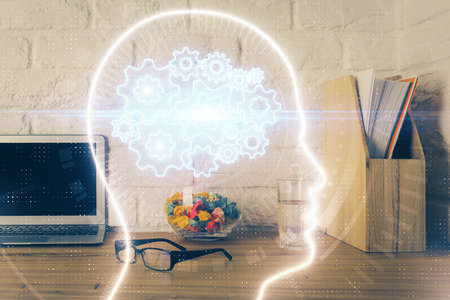 Double exposure of desktop computer and human brain drawing hologram. Ai concept.