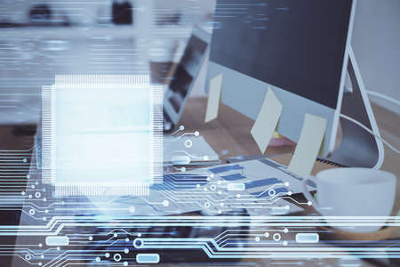 Double exposure of desktop computer and technology theme hologram. Concept of software development.