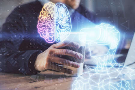 AR hologram with man working on computer on background. Augmented reality concept. Double exposure.