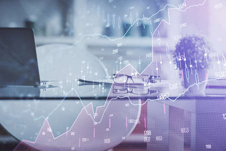 Double exposure of financial graph drawing and office interior background. Concept of stock market.の写真素材
