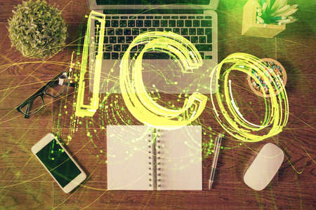 Blockchain theme hologram drawings over computer on the desktop background. Top view. Double exposure.の写真素材