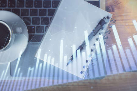 Multi exposure of forex chart drawing and work table top veiw. Concept of financial analysis.