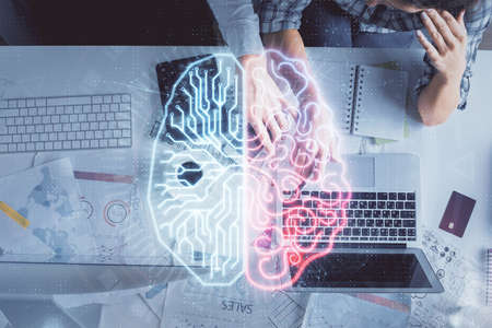 Double exposure of man and woman working together and human brain hologram drawing. Brainstorm...