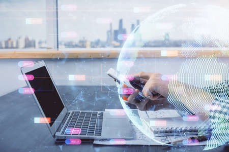 Multi exposure of man's hands holding and using a digital device and map drawing. International business concept.の写真素材