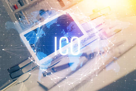 Multi exposure of blockchain theme hologram and table with computer background. Concept of bitcoin...