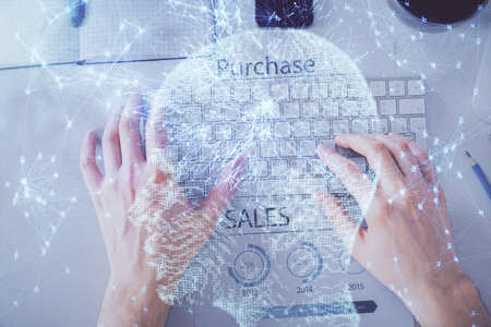 Double exposure of mans hands typing over computer keyboard and brain hologram drawing. Top view. Ai...
