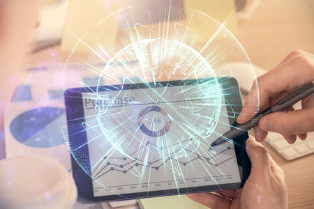 Double exposure of mans hands holding and using a phone and international business theme drawing.の写真素材