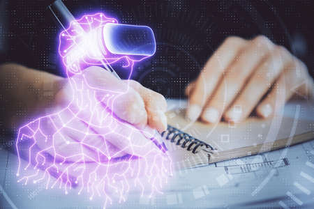 AR hologram over womans hands taking notes background. Concept of augmented reality. Multi exposure