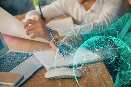 Double exposure of social network theme drawing over people taking notes background. Concept of...