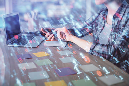 Multi exposure of woman hands working on computer and data theme hologram drawing. Tech concept.