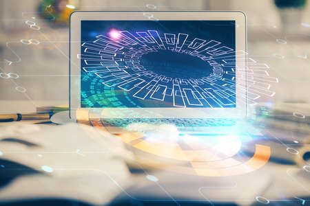 Multi exposure of desktop computer and technology theme hologram. Concept of software development.の写真素材