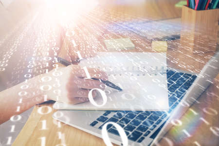 Multi exposure of womans hands on background with technology and digital coding icons. Data...