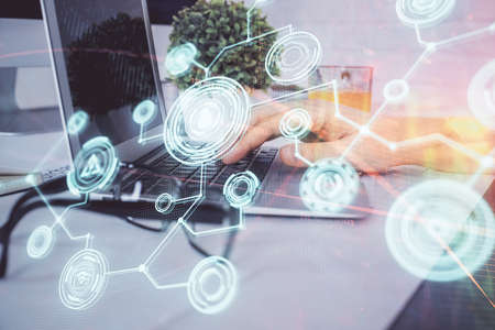 Social network theme hologram with businessman working on computer on background. Multi exposure.の写真素材