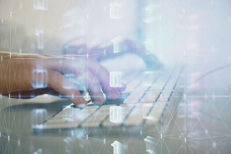 Double exposure of data internet theme hologram with man working on computer on background. Concept...