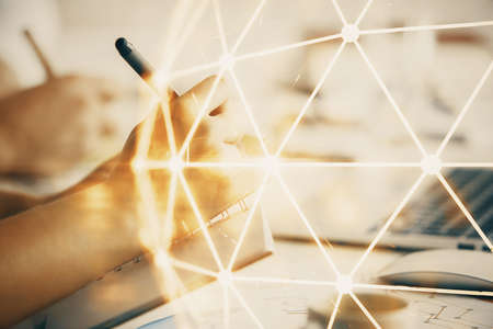 Double exposure of social network theme drawing over people taking notes background. Concept of human connectionの写真素材